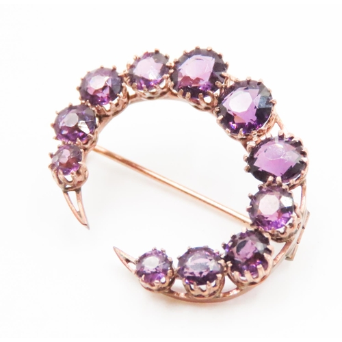 605 - Amethyst Eleven Stone Graduated Form Crescent Brooch Set in 9 Carat Rose Gold 3cm Wide