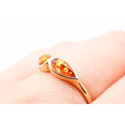 620 - Pear Cut Amber Twin Stone Set Ring Mounted in 18 Carat Yellow Gold Ring Size R