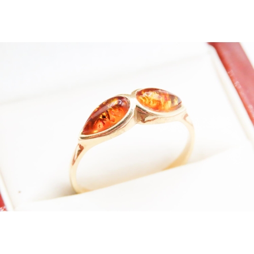 620 - Pear Cut Amber Twin Stone Set Ring Mounted in 18 Carat Yellow Gold Ring Size R