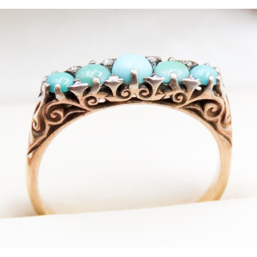 626 - Finely Detailed Turquoise Graduated Form Ring Further Diamond Insets Mounted in 18 Carat Yellow Gold... 