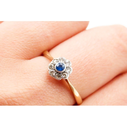 627 - Sapphire and Old Cut Diamond Set Ladies Daisy Cluster Ring Mounted in 18 Carat Yellow Gold Ring Size... 