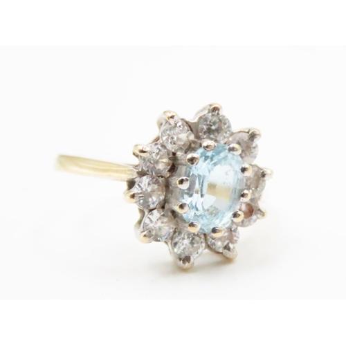 632 - Aquamarine and Gemstone Set Ladies Cluster Ring Mounted in 9 Carat Yellow Gold Ring Size M