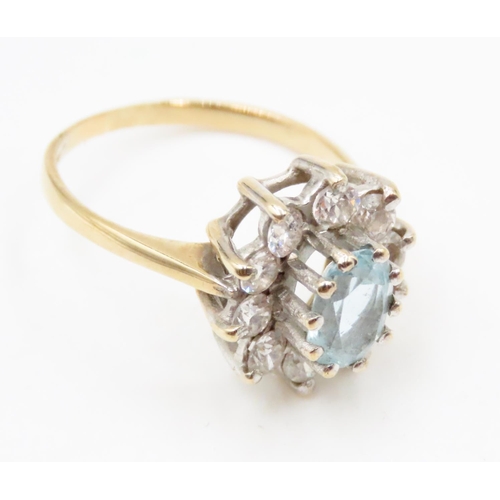 632 - Aquamarine and Gemstone Set Ladies Cluster Ring Mounted in 9 Carat Yellow Gold Ring Size M