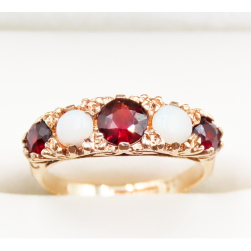 Red Garnet and Opal Set Ring Attractively Detailed Mounted in 9 Carat Yellow Gold Ring Size K