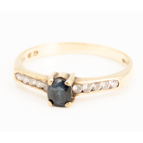 67 - Sapphire Set Ring Mounted in 9 Carat Yellow Gold Further Gemstone Set to Sides Ring Size P