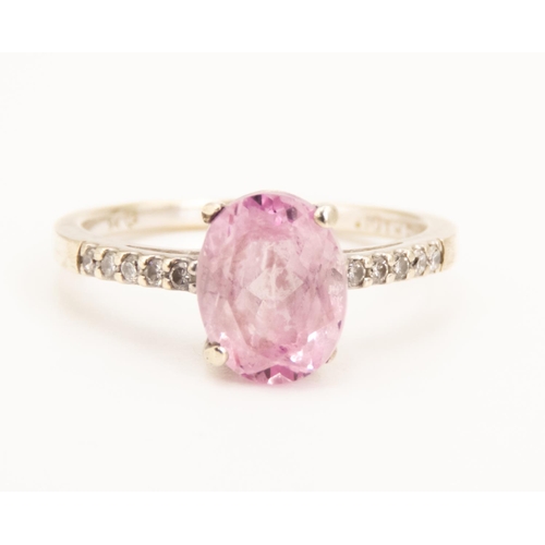 85 - Oval Cut Pink Kunzite Solitaire Ring Mounted in 9 Carat White Gold Further Diamonds Set to Shoulders... 