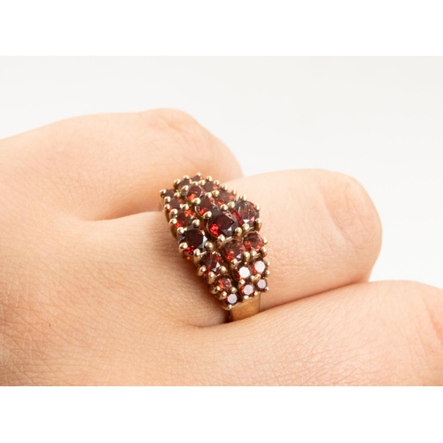 86 - Red Garnet Three Row Graduated Form Cluster Ring Set in 9 Carat Yellow Gold Ring Size O