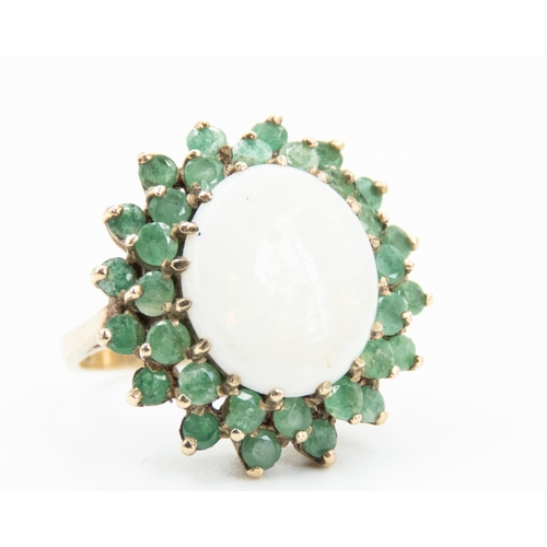 90 - Opal Centre Stone Statement Ring Mounted in 9 Carat Yellow Gold Emerald Set Double Halo Surround Rin... 