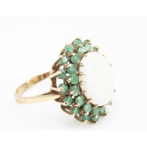 90 - Opal Centre Stone Statement Ring Mounted in 9 Carat Yellow Gold Emerald Set Double Halo Surround Rin... 