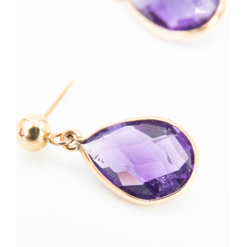 96 - Pair of Facet Pear Cut Amethyst Ladies Drop Earrings Set in 9 Carat Yellow Gold 1.5cm High