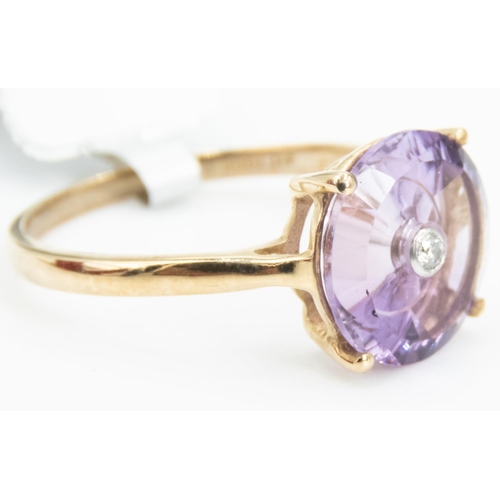 98 - Unusual Form Amethyst Set Ring with Diamond Inset to Centre Mounted in 9 Carat Yellow Gold Ring Size... 