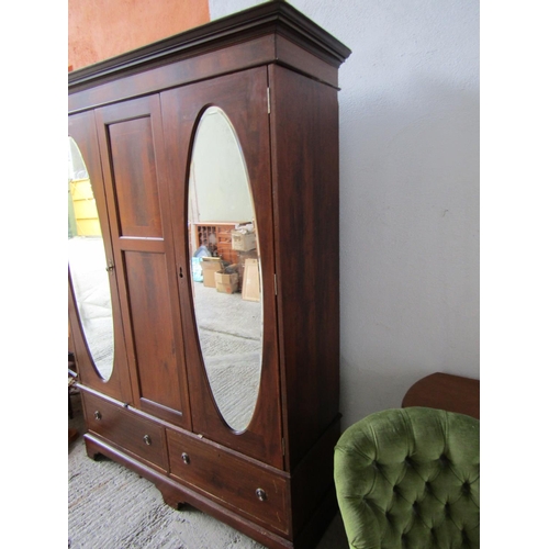 1014 - Antique Mahogany Wardrobe Twin Doors with Inset Oval Mirrored Center Panel Twin Linen Drawers to Bas... 