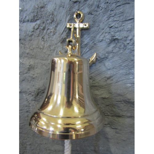 1038 - Ships Bell Cast Polished Brass with Anchor Motif Wall Mount Decoration Approximately 12 Inches High