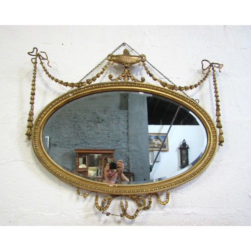 1047 - Victorian Adams Form Gilded Oval Form Wall Mirror with Upper Urn and Swag Motif Decoration Approxima... 