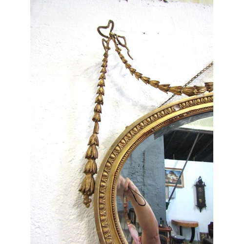 1047 - Victorian Adams Form Gilded Oval Form Wall Mirror with Upper Urn and Swag Motif Decoration Approxima... 