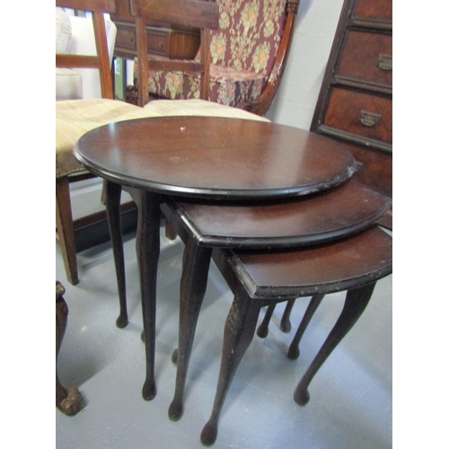 1049 - Graduated Set of Three Oval Form Mahogany Occasional Tables Shaped Supports Largest Approximately 20... 