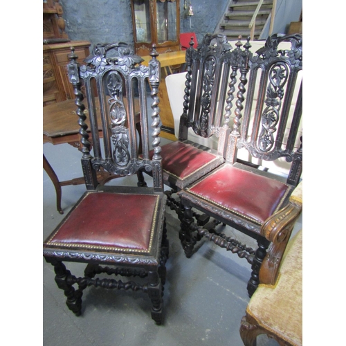 1054 - Three Carved Oak Jacobean Side or Hall Chairs