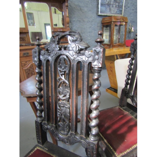 1054 - Three Carved Oak Jacobean Side or Hall Chairs