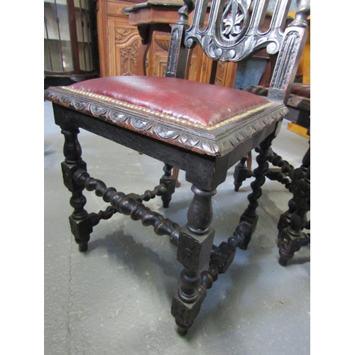 1054 - Three Carved Oak Jacobean Side or Hall Chairs