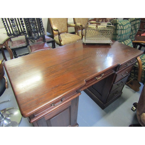 1101 - Mahogany Three Drawer Desk with Cupboard Pedestal Bases Approximately 5ft Wide