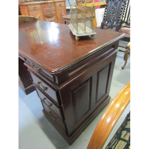 1101 - Mahogany Three Drawer Desk with Cupboard Pedestal Bases Approximately 5ft Wide