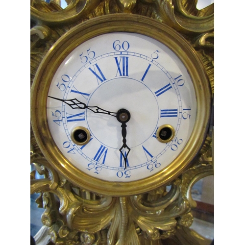 1122 - Antique Ormolu Rocco Form Table Clock Attractively Detailed with Cherub Motif Appliques Roman Numera... 