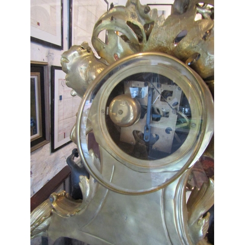 1122 - Antique Ormolu Rocco Form Table Clock Attractively Detailed with Cherub Motif Appliques Roman Numera... 