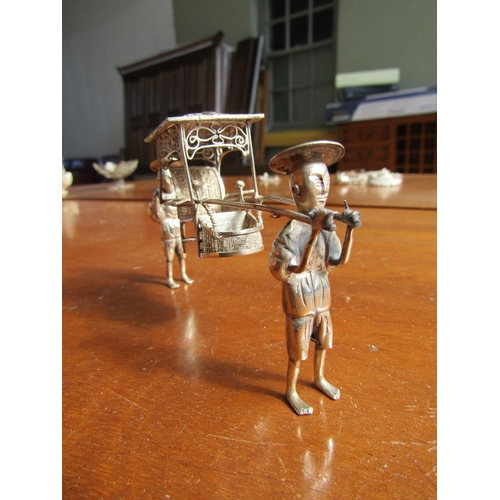 1192 - Novelty Piece Silver Two Figures with Salon Carry Chair Approximately 9cm Long