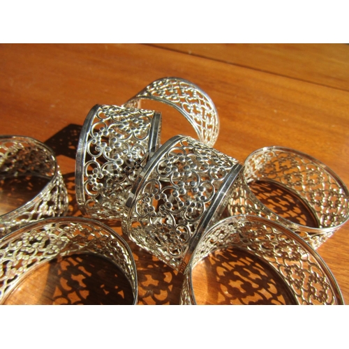 1210 - Seven Silver Napkin Rings