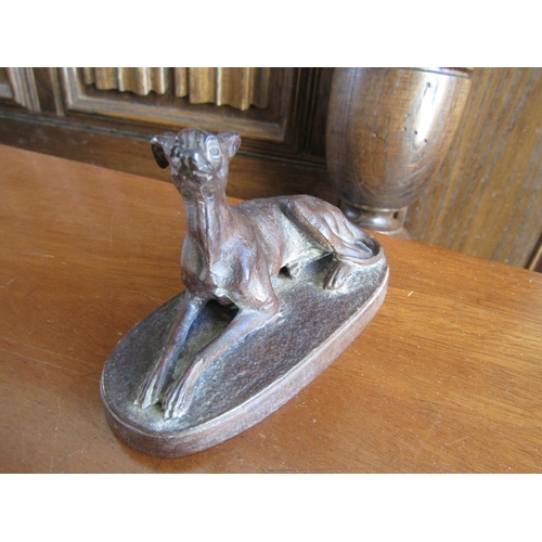 711 - Antique Bronze of Seated Whippet Approximately 5 Inches Wide