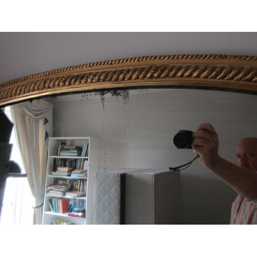 751 - Victorian Arch Top Gilded Overmantle Mirror Approximately 50 Wide x 32 Inches High