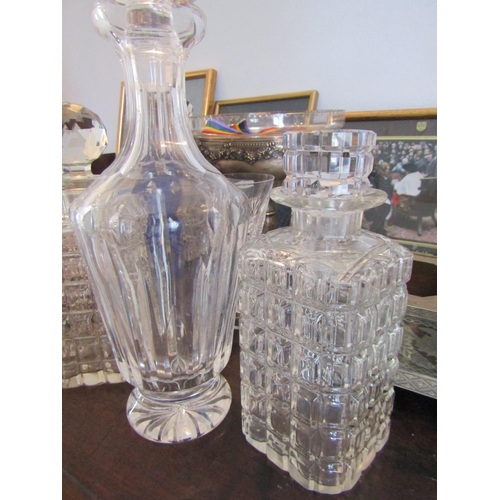 768 - Three Irish Cut Crystal Decanters Including Waterford Example Stoppers Present