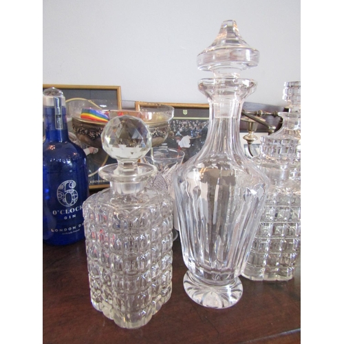 768 - Three Irish Cut Crystal Decanters Including Waterford Example Stoppers Present