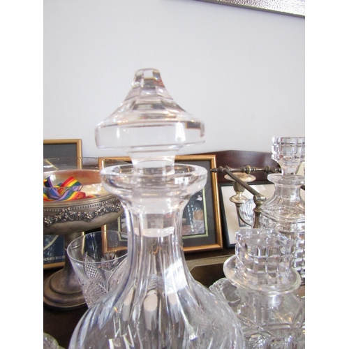 768 - Three Irish Cut Crystal Decanters Including Waterford Example Stoppers Present