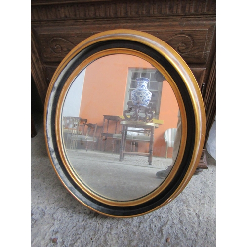 831 - Oval Form Wall Mirror Gilded Frame Approximately 22 Inches High