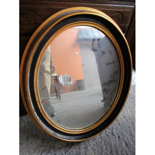 831 - Oval Form Wall Mirror Gilded Frame Approximately 22 Inches High