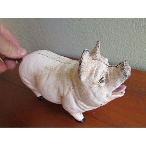 846 - Cast Iron Pig Figure with Tongue and Tail Wagging Mechanism