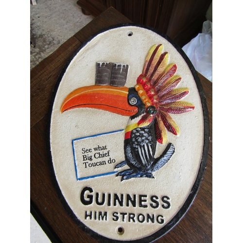 848 - Two Guinness Advertising Signs Cast Metal Widest Approximately 12 Inches Wide