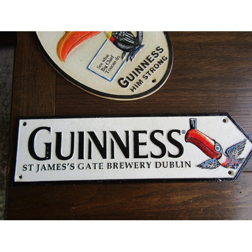 848 - Two Guinness Advertising Signs Cast Metal Widest Approximately 12 Inches Wide