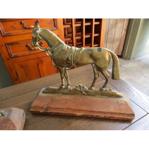 852 - Two Horse Motif Door Stops Brass on Wooden Bases Each Approximately 11 Inches Wide