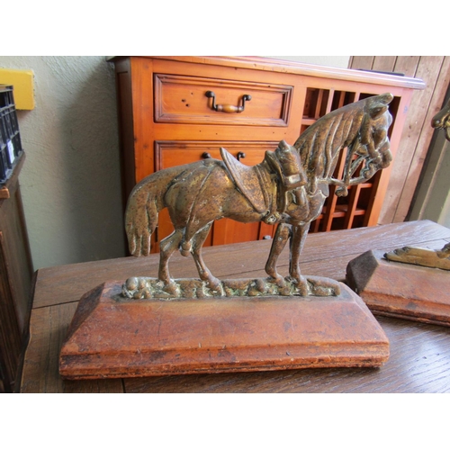 852 - Two Horse Motif Door Stops Brass on Wooden Bases Each Approximately 11 Inches Wide