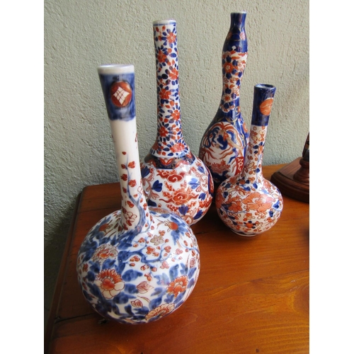 875 - Four Antique Imari Vases Including Three Slenderneck Examples Tallest Approximately 12 Inches High