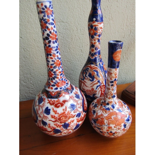 875 - Four Antique Imari Vases Including Three Slenderneck Examples Tallest Approximately 12 Inches High