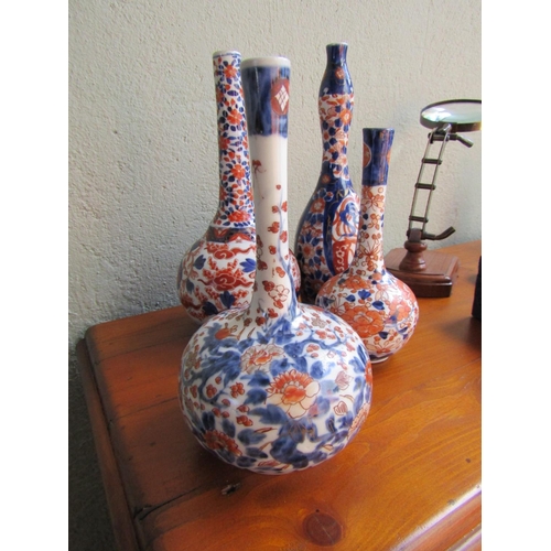 875 - Four Antique Imari Vases Including Three Slenderneck Examples Tallest Approximately 12 Inches High