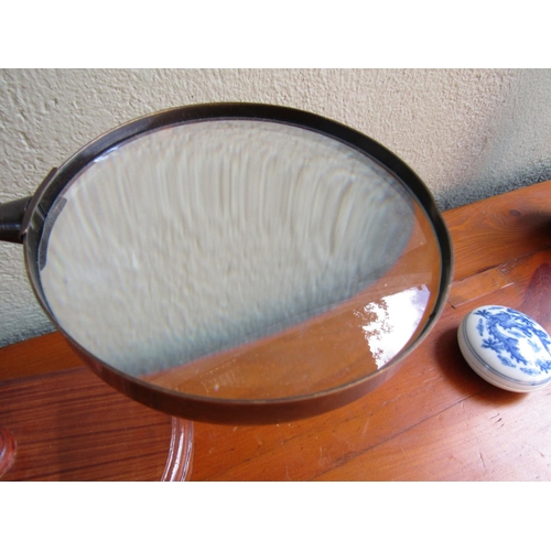 877 - Desktop Magnifying Glass Arched Form with Carved Base Approximately 8 Inches High Adjustable Lens