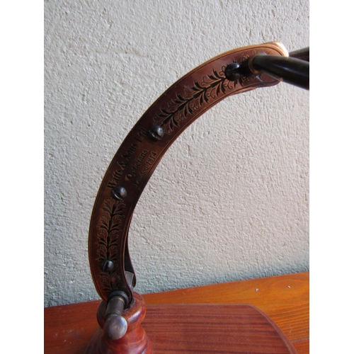 877 - Desktop Magnifying Glass Arched Form with Carved Base Approximately 8 Inches High Adjustable Lens