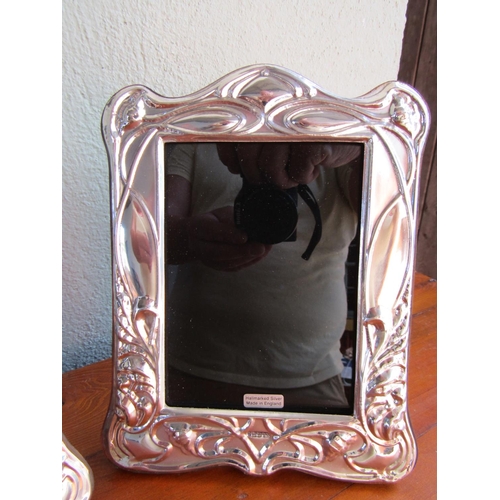 891 - Pair of Silver Table Top Photograph Frames Hallmarked Each Approximately 8 Inches High