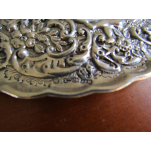 892 - Silver Table Dish Embossed Decoration Cherub Motifs Shaped Form 7 Inches Wide