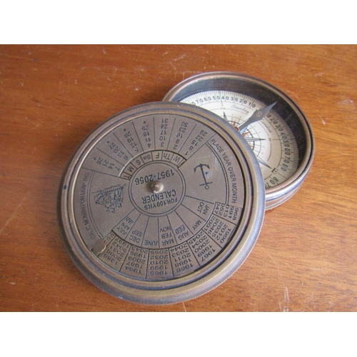 911 - Ships Compass with Calendar Mechanized Cover Bronze Approximately 8 cm Diameter