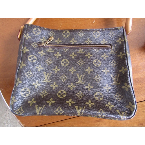 913 - Louis Vuitton Leather Handbag